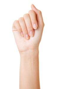 23367867 - woman's hand on white background